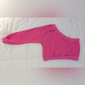 The vintage shop brand pink sweatshirt M stylish exposed shoulder and arm.